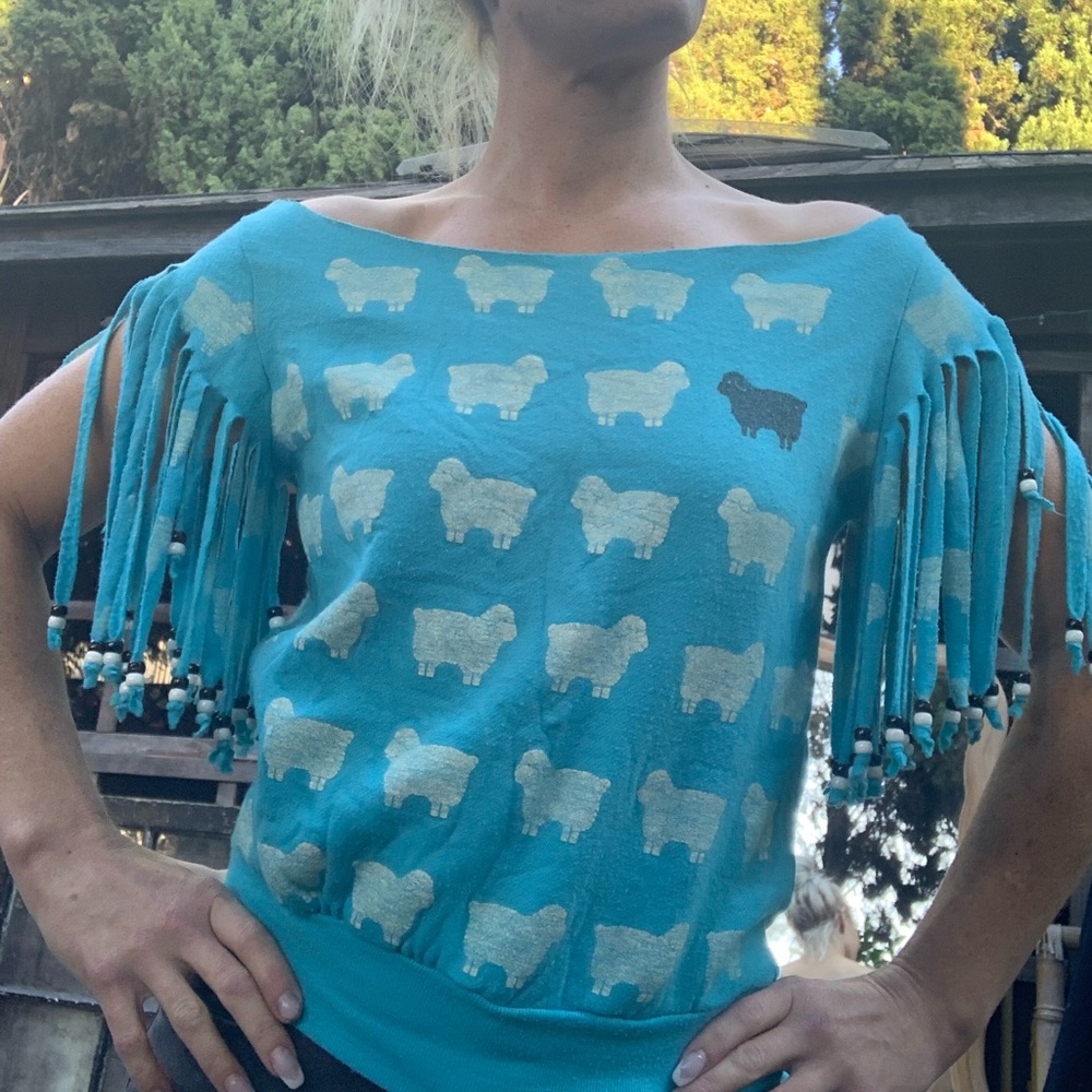 Original piece. Black sheep w beaded sleeves